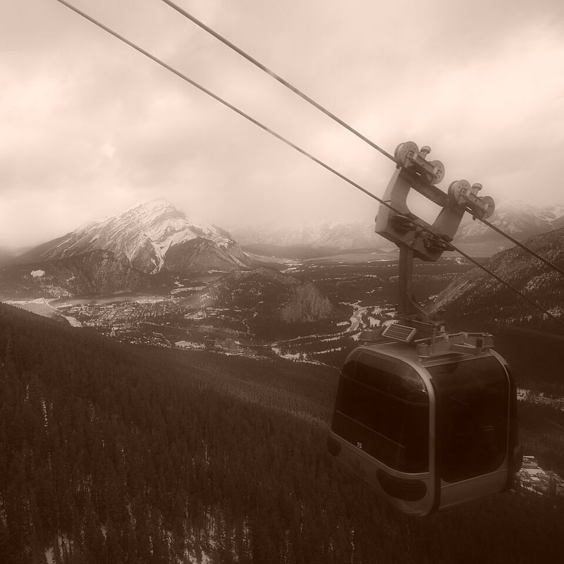 A Banff Gondola cabin rising up Sulphur Mountain